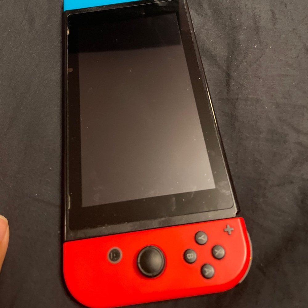 Nintendo switch with 4 games and micro SD